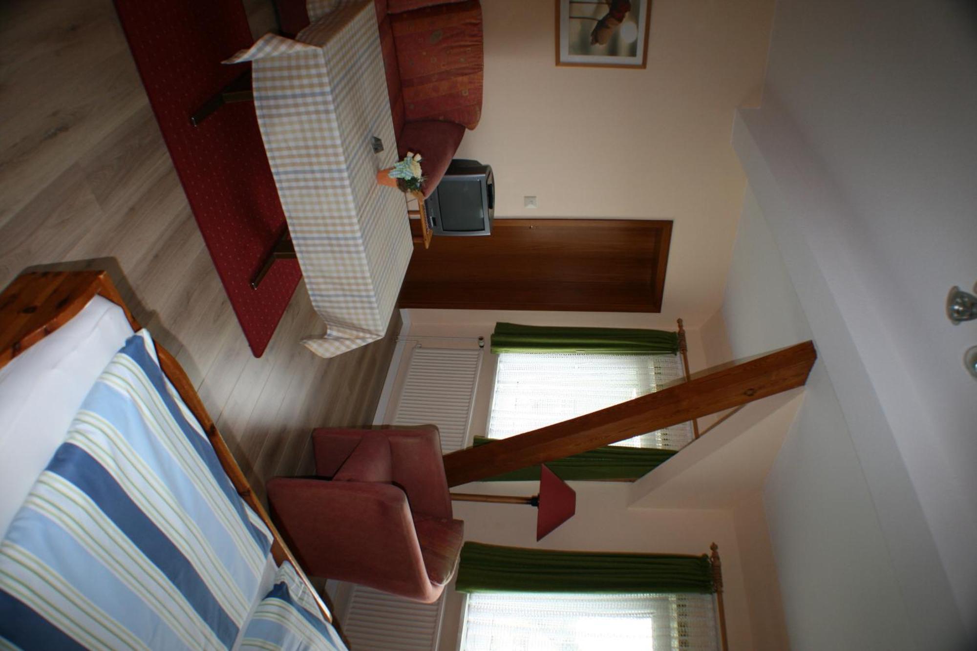 Hotel Garni Zur Post Utersum Quarto foto